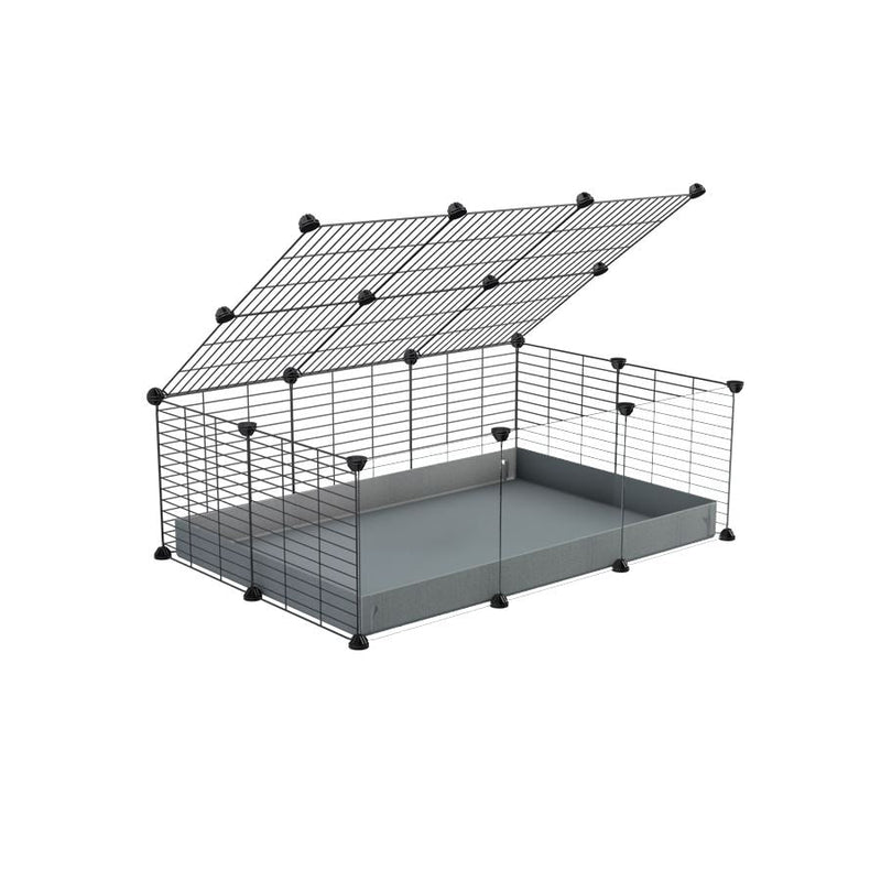 A 2x3 C and C cage with clear transparent plexiglass acrylic grids  for guinea pigs with gray coroplast a lid and small hole grids from brand kavee