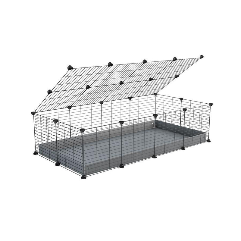 A 2x4 C and C cage for guinea pigs with gray coroplast a lid and small hole grids from brand kavee
