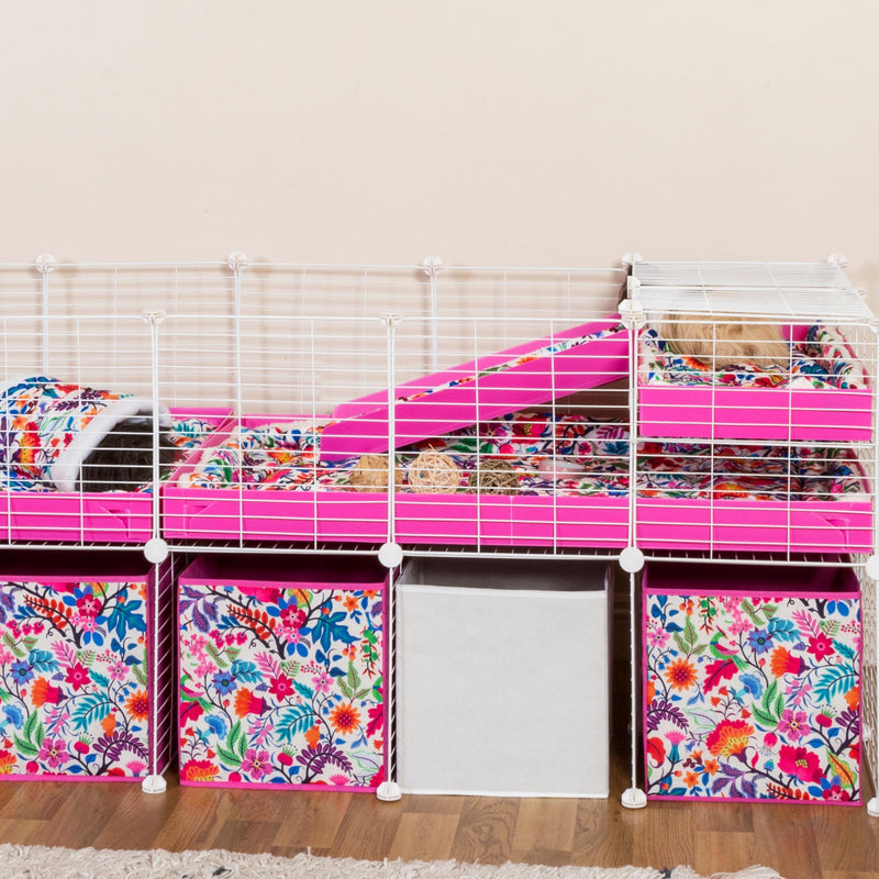 white 6x2 C&C cage for guinea pigs with stand, ramp and loft, and flower boxes pink coroplast from kavee