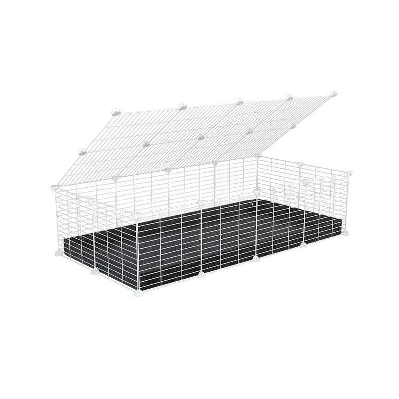 A 2x4 C and C cage for guinea pigs with black coroplast a lid and small hole white C&C grids from brand kavee