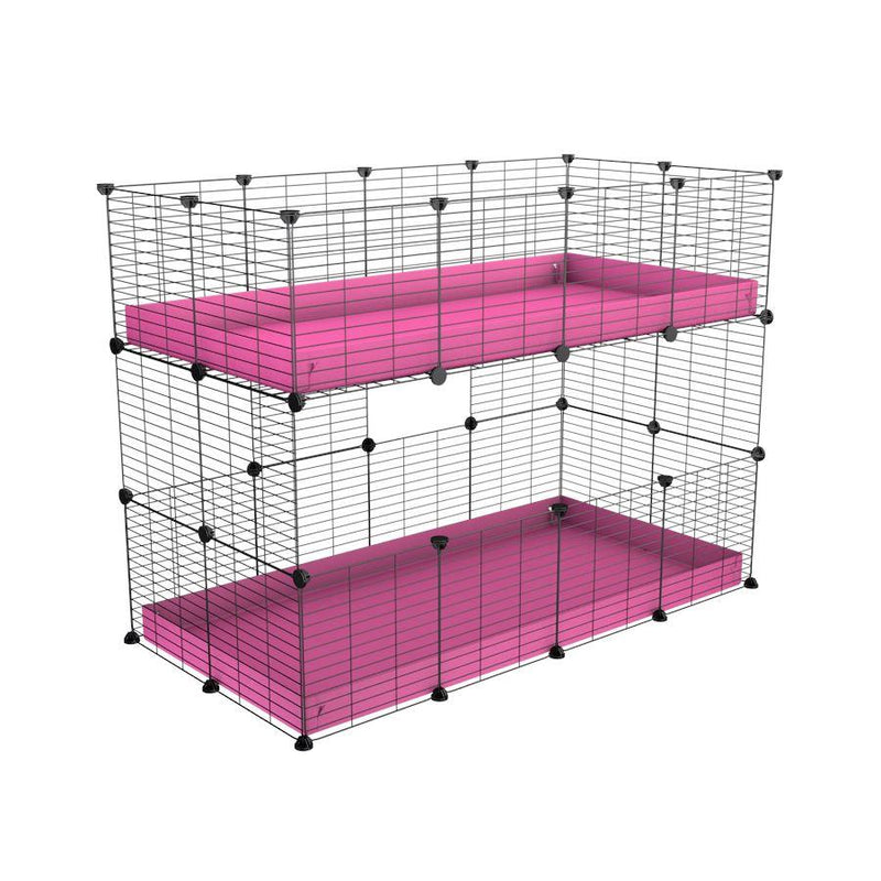 A 4x2 double stacked c and c guinea pig cage with two stories pink coroplast safe size grids by brand kavee