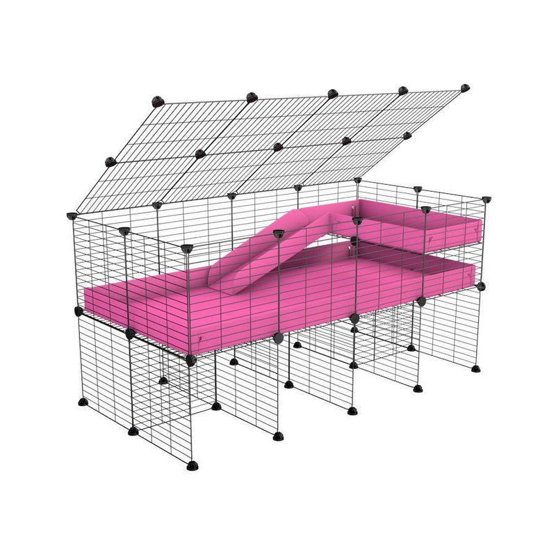A 2x4 C and C guinea pig cage with stand loft ramp lid small size meshing safe grids pink correx sold in USA