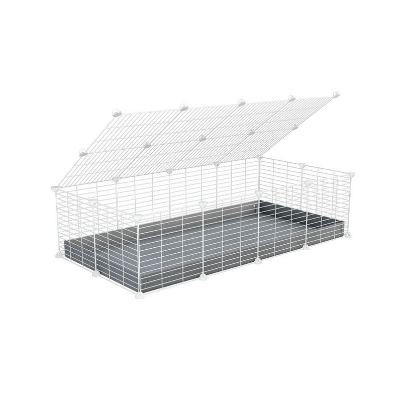 A 2x4 C and C cage for guinea pigs with gray coroplast a lid and small hole white CC grids from brand kavee