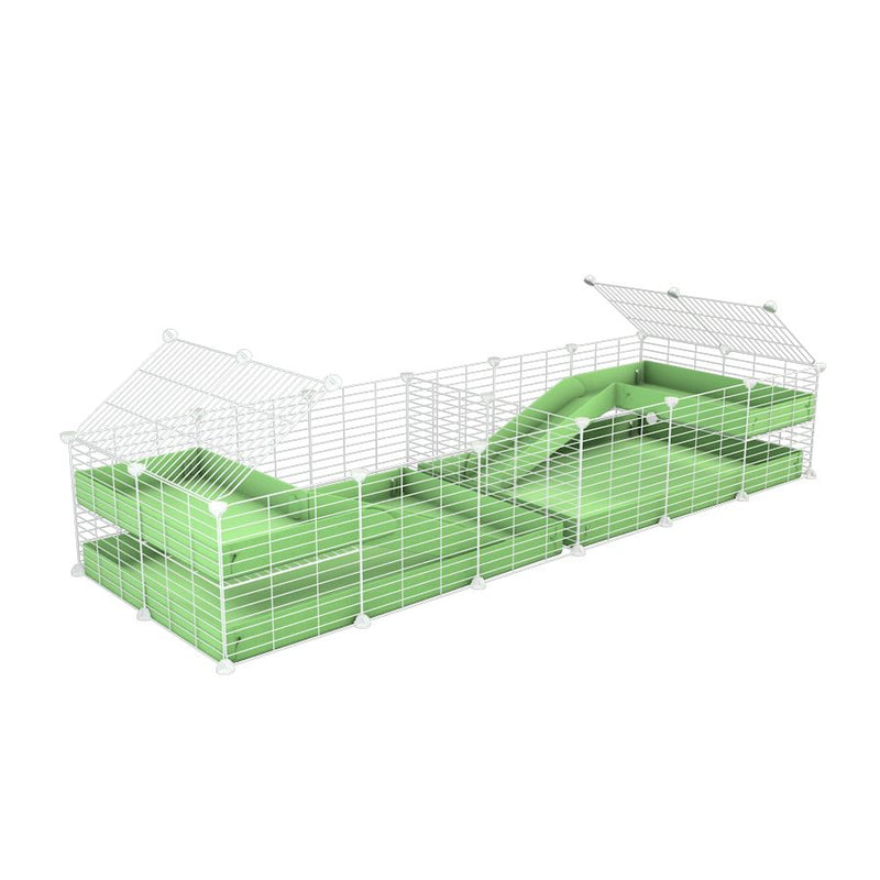 A 6x2 white C&C cage with divider and loft ramp for guinea pig fighting or quarantine with green coroplast from brand kavee