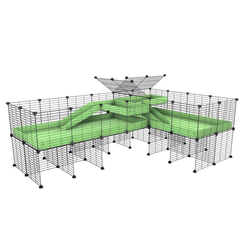 A 8x2 L-shape C&C cage with divider and stand loft ramp for guinea pig fighting or quarantine with green coroplast from brand kavee