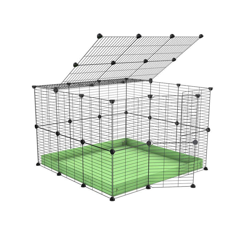 A 3x3 C and C rabbit cage with lid and safe baby grids green pastel coroplast by kavee USA