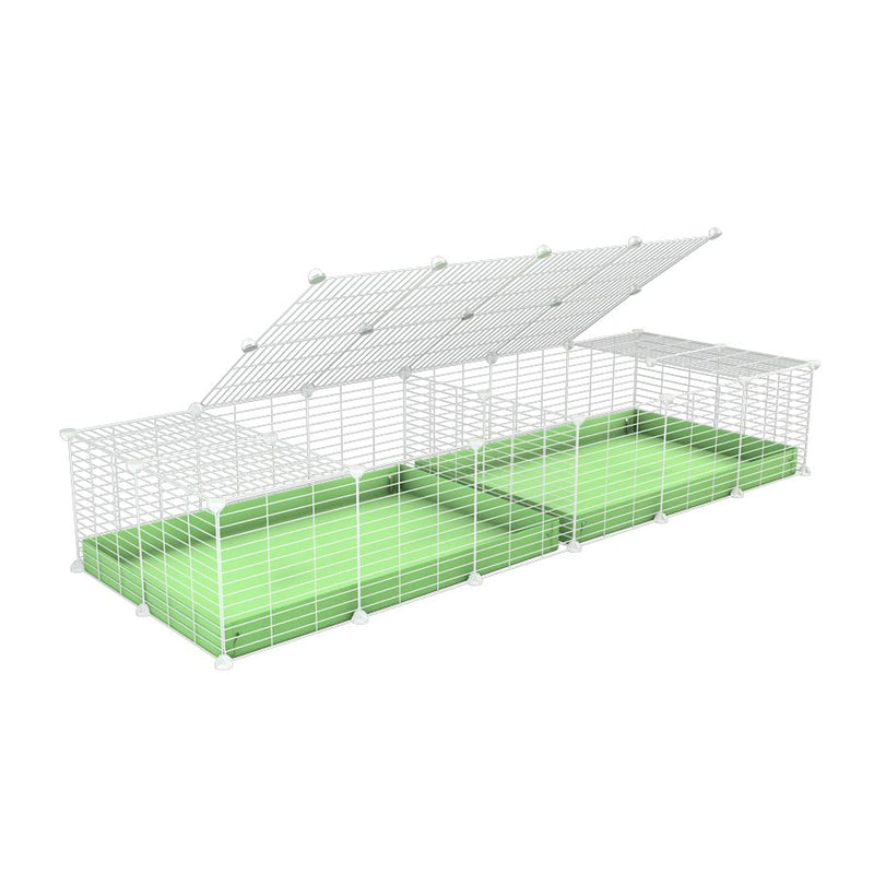 A 6x2 white C&C cage with lid divider for guinea pig fighting or quarantine with green coroplast from brand kavee