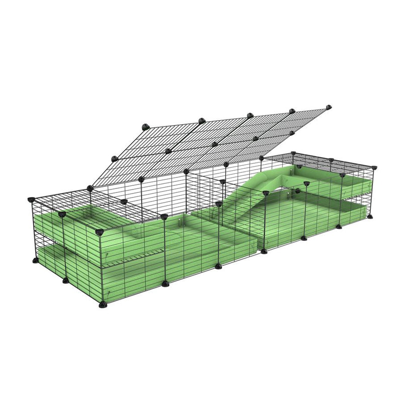 A 6x2 C&C cage with lid divider loft ramp for guinea pig fighting or quarantine with green coroplast from brand kavee