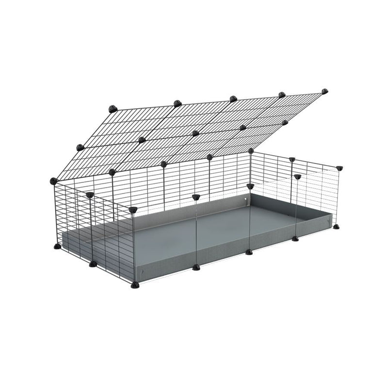 A 2x4 C and C cage with clear transparent plexiglass acrylic grids  for guinea pigs with gray coroplast a lid and small hole grids from brand kavee