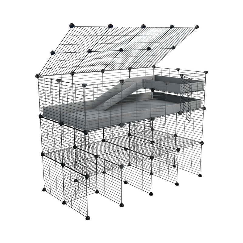A 2x4 kavee pink C and C guinea pig cage with three levels a loft a ramp a lid made of small size meshing safe grids