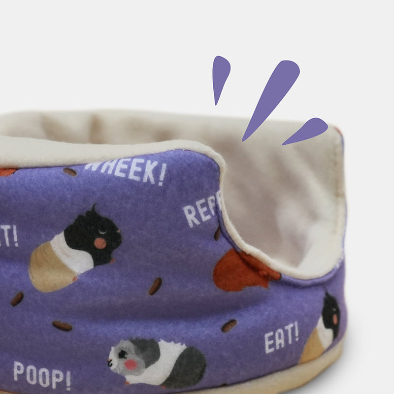 Zoom in on purple cuddle cup with poop design by kavee on grey background with illustration