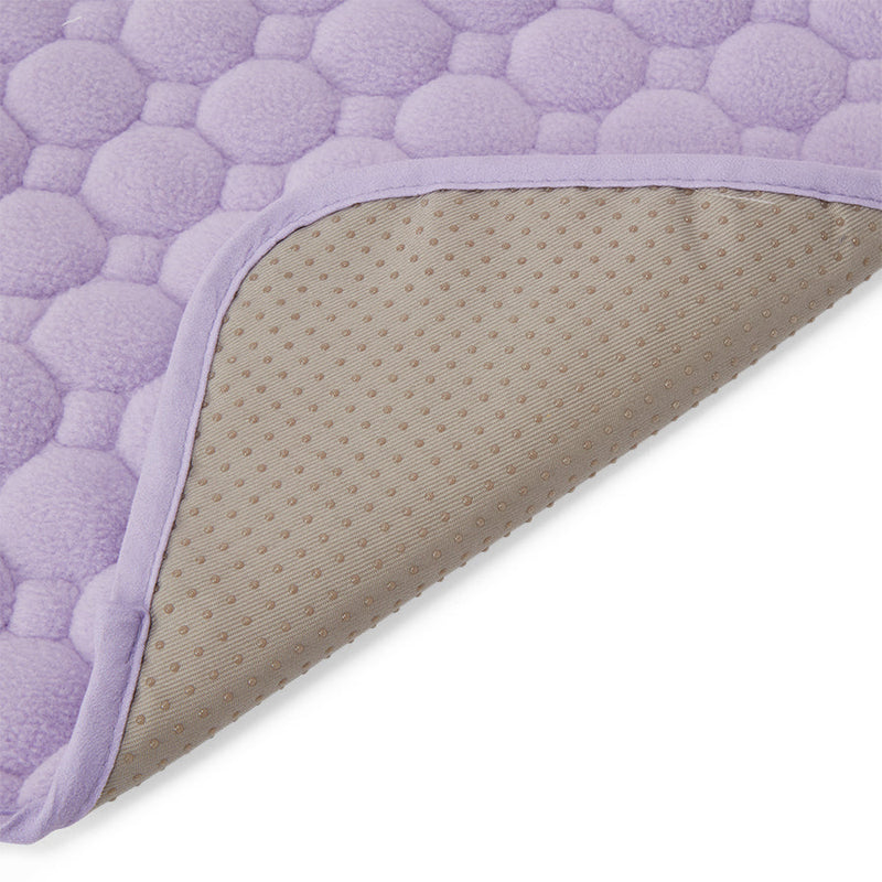 An image of the inside corner of Kavee's waterproof guinea pig lap pad in lilac
