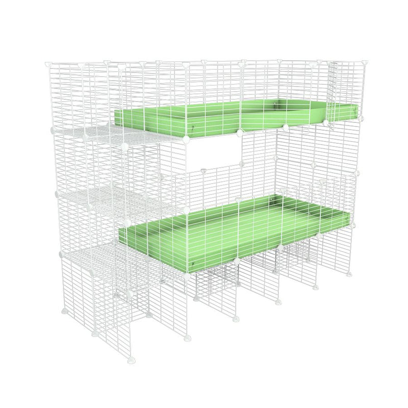 A two tier white 4x2 c&c cage with stand and side storage for guinea pigs with two levels green pastel correx baby safe grids by brand kavee in the USA