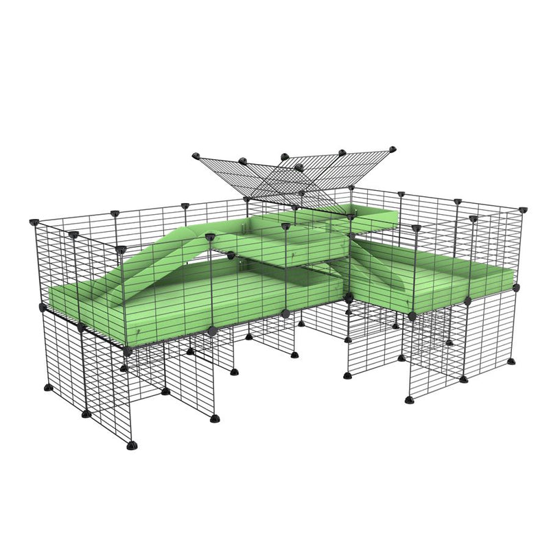 A 6x2 L-shape C&C cage with divider and stand loft ramp for guinea pig fighting or quarantine with green coroplast from brand kavee