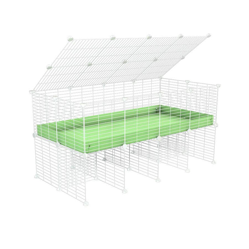 a 4x2 C&C cage for guinea pigs with a stand and a top green pastel pistachio plastic safe white C&C grids by kavee