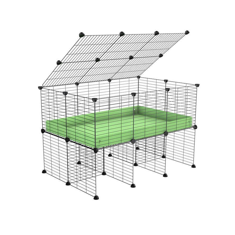 a 3x2 C&C cage for guinea pigs with a stand and a top green pastel pistachio plastic safe grids by kavee