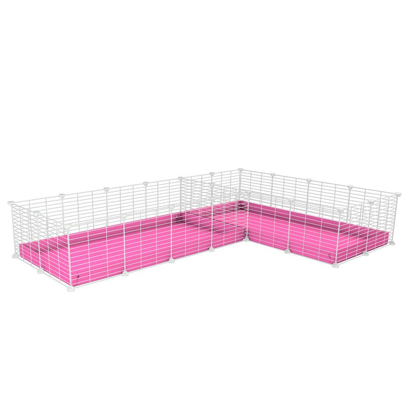 A 8x2 L-shape white C&C cage with divider for guinea pig fighting or quarantine with pink coroplast from brand kavee