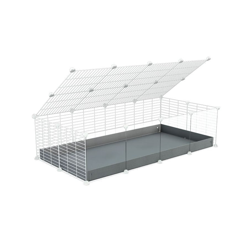 A 2x4 C and C cage with clear transparent plexiglass acrylic grids  for guinea pigs with gray coroplast a lid and small hole white CC grids from brand kavee